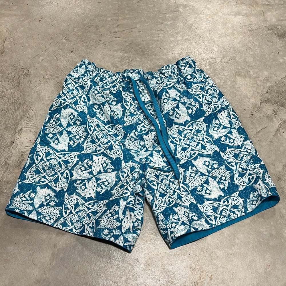 Margaritaville aqua blue w/white design swim trunks / size L / G-18